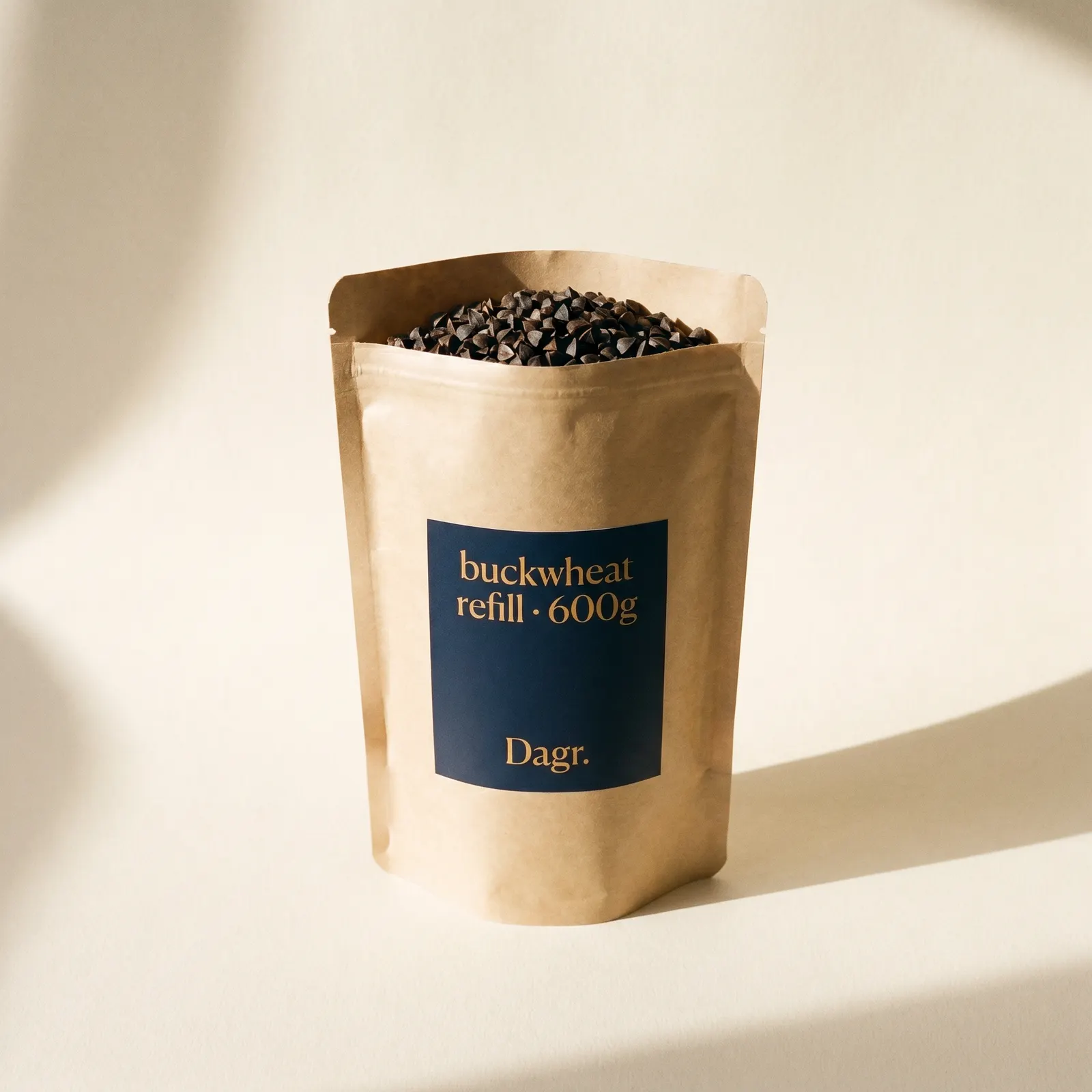 Kraft refill pouch with buckwheat hulls